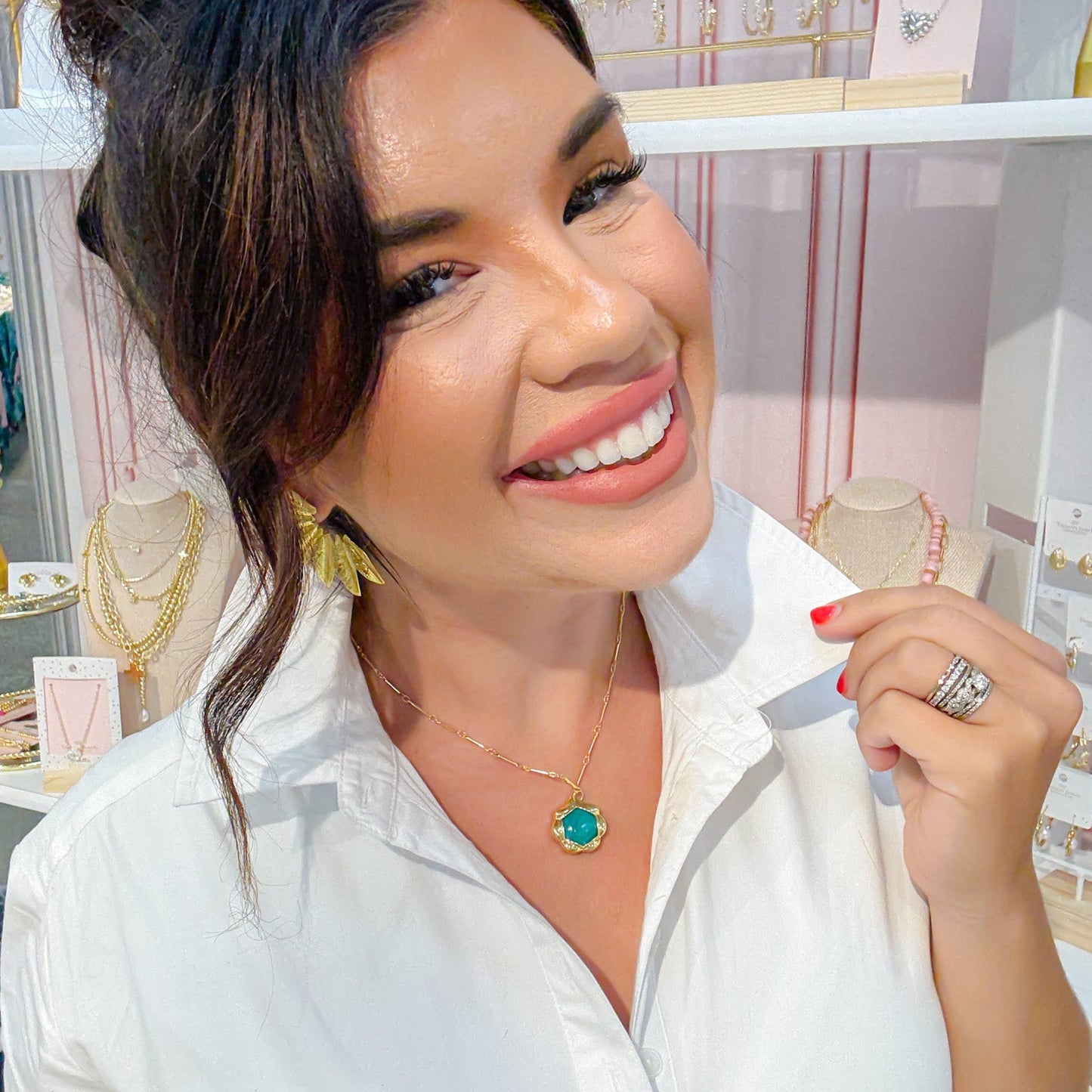 Dainty gold layered necklace with green gemstone pendant, trendy statement accessory for wholesale jewelry for women’s boutiques, boutique wholesale jewelry, waterproof necklaces that are hypoallergenic and tarnish free