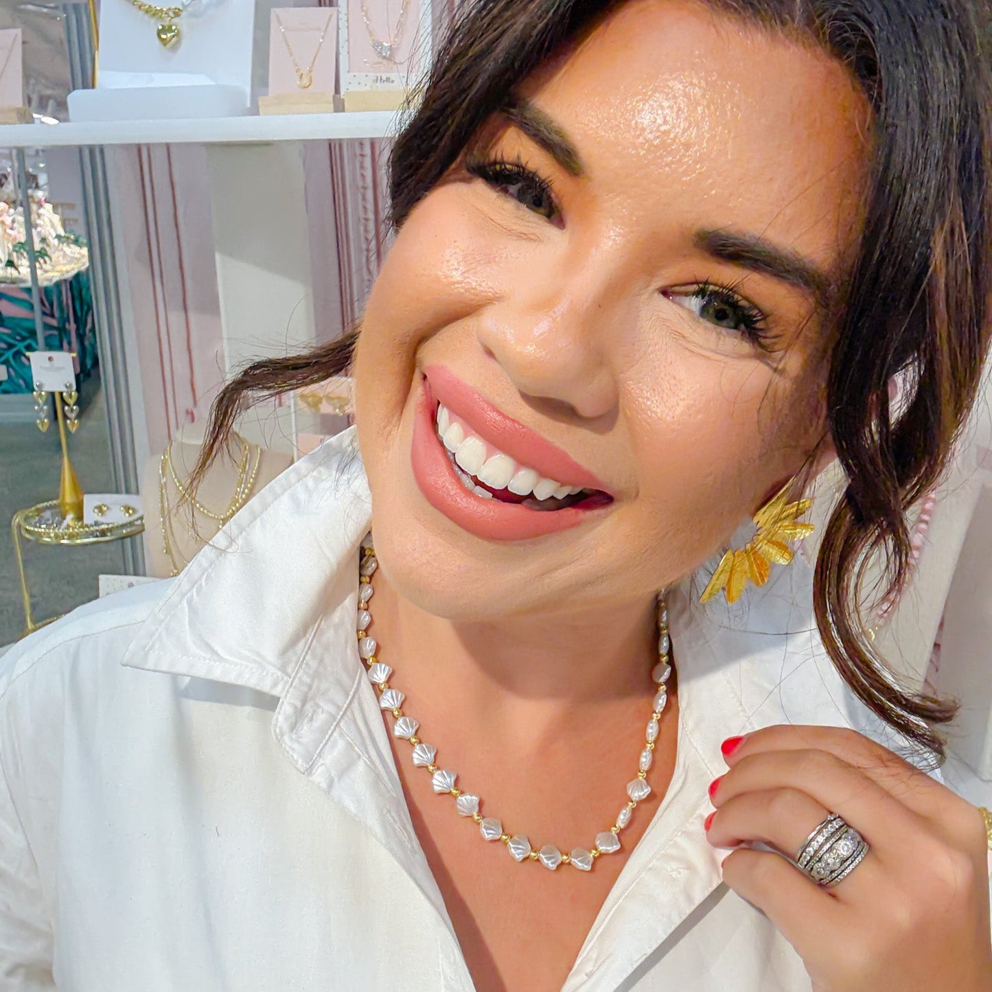 dainty gold layered necklace with white seashell shaped beads and gold accent beads, wholesale jewelry for women boutiques, statement accessories, waterproof, hypoallergenic, tarnish free