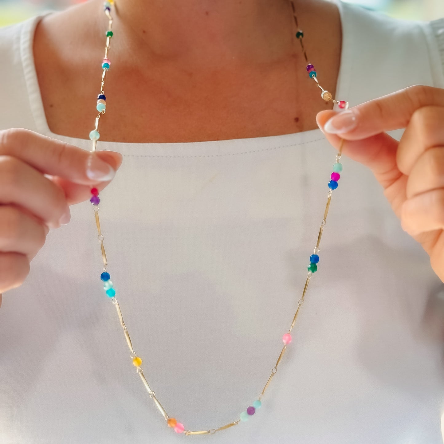 Colorful charms gold necklace featuring gemstone details, layered jewelry design, trendy accessory for women’s jewelry collections, boutique wholesale fashion necklace that is hypoallergenic, tarnish free, and waterproof jewelry with a cute aesthetic statement style