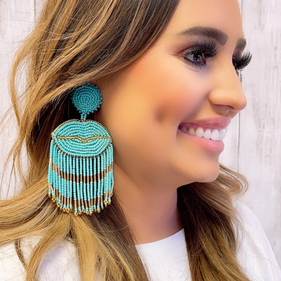 Lip Tassel Turquoise D8