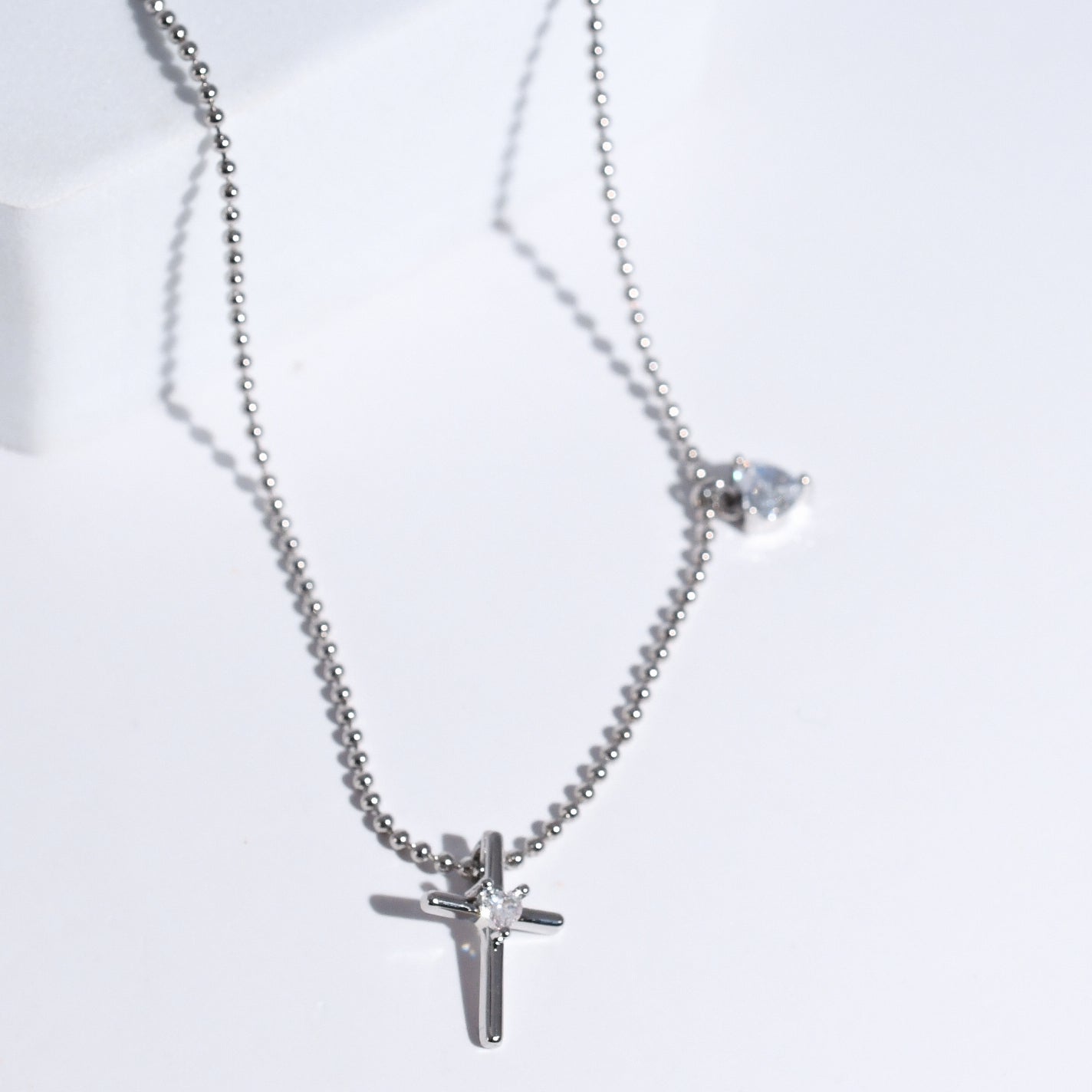 premium silver necklace crafted for everyday wear, offering a dainty handcrafted style with a waterproof, hypoallergenic, tarnish free finish, ideal for minimal modern jewelry lovers, available as wholesale for boutiques,cross