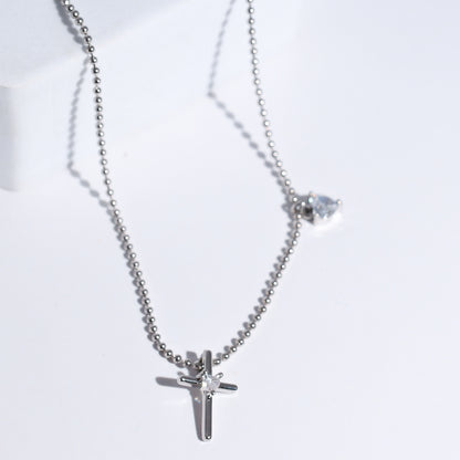 premium silver necklace crafted for everyday wear, offering a dainty handcrafted style with a waterproof, hypoallergenic, tarnish free finish, ideal for minimal modern jewelry lovers, available as wholesale for boutiques,cross