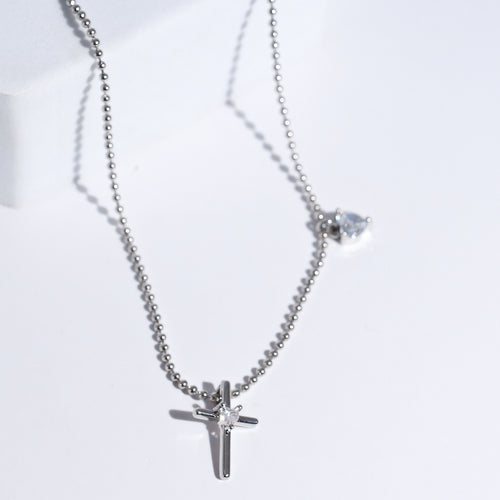 premium silver necklace crafted for everyday wear, offering a dainty handcrafted style with a waterproof, hypoallergenic, tarnish free finish, ideal for minimal modern jewelry lovers, available as wholesale for boutiques,cross