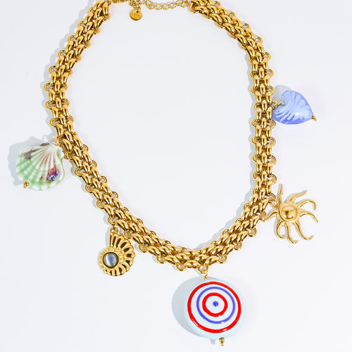 Colorful charms gold necklace featuring gemstone details, layered jewelry design, trendy accessory for women’s jewelry collections, boutique wholesale fashion necklace that is hypoallergenic, tarnish free, and waterproof jewelry with a cute aesthetic statement style