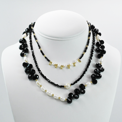 Colorful charms gold necklace featuring gemstone details, layered jewelry design, trendy accessory for women’s jewelry collections, boutique wholesale fashion necklace that is hypoallergenic, tarnish free, and waterproof jewelry with a cute aesthetic statement style