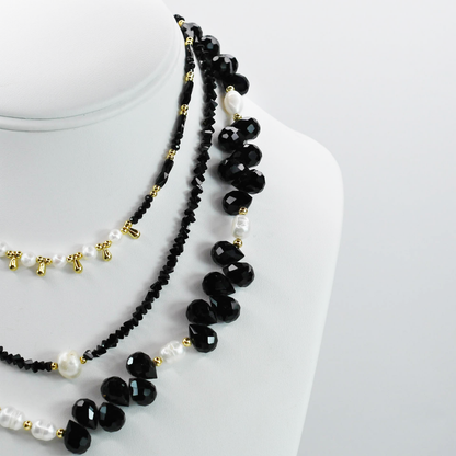 Colorful charms gold necklace featuring gemstone details, layered jewelry design, trendy accessory for women’s jewelry collections, boutique wholesale fashion necklace that is hypoallergenic, tarnish free, and waterproof jewelry with a cute aesthetic statement style