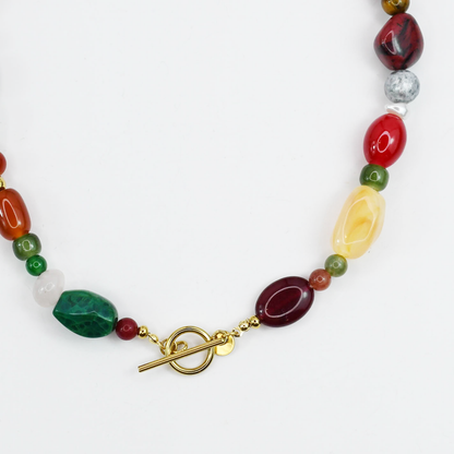 Colorful charms gold necklace featuring gemstone details, layered jewelry design, trendy accessory for women’s jewelry collections, boutique wholesale fashion necklace that is hypoallergenic, tarnish free, and waterproof jewelry with a cute aesthetic statement style
