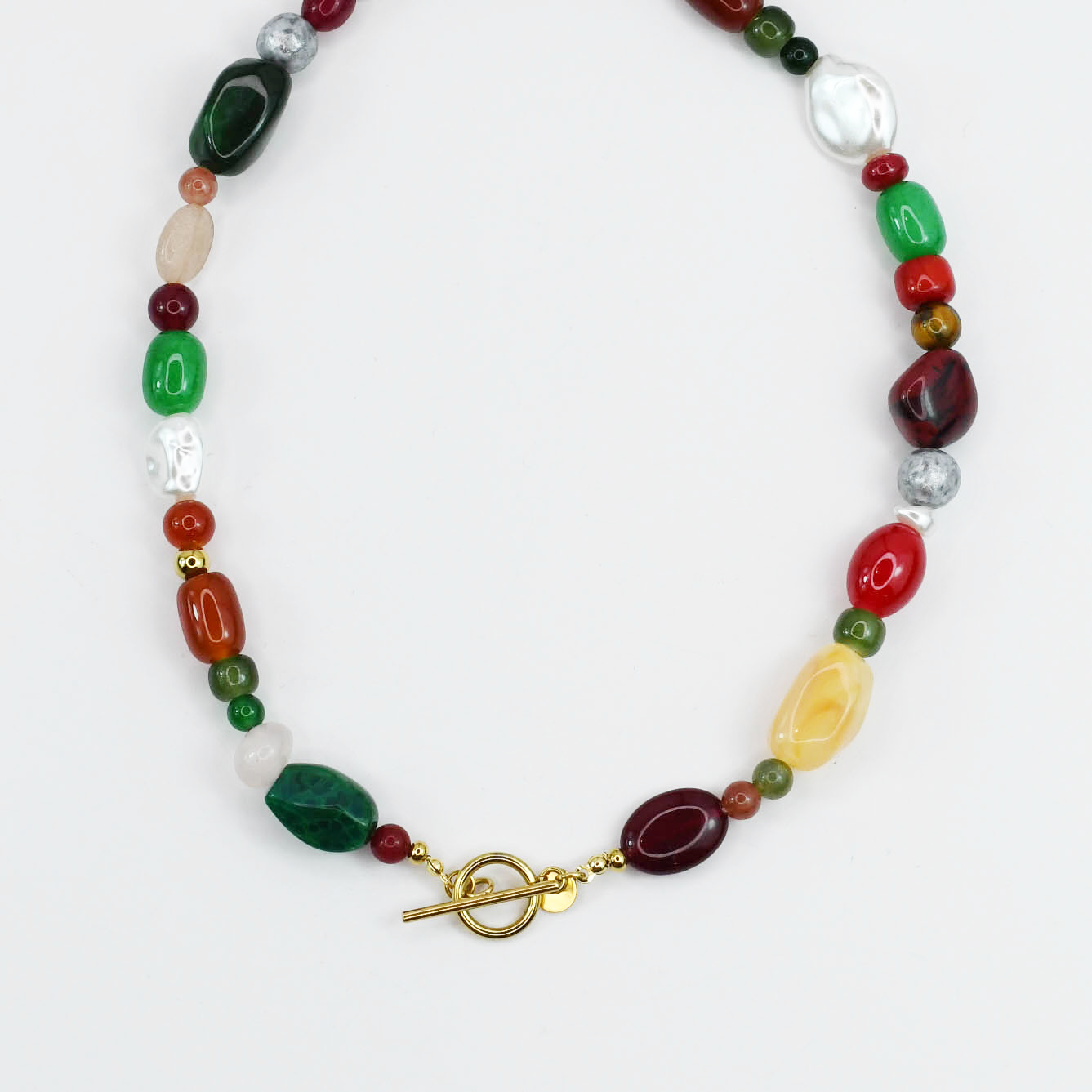 Colorful charms gold necklace featuring gemstone details, layered jewelry design, trendy accessory for women’s jewelry collections, boutique wholesale fashion necklace that is hypoallergenic, tarnish free, and waterproof jewelry with a cute aesthetic statement style