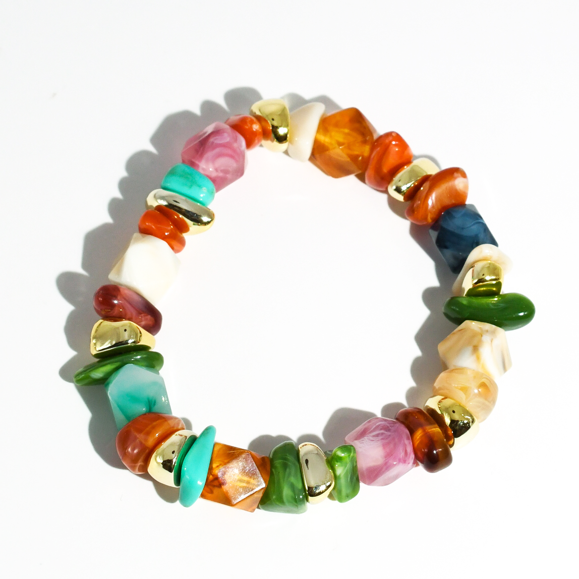 colorful gemstone jewelry, beaded fashion bracelet, gold or silver tone accessory, handcrafted beaded piece, trendy boho chic jewelry, vibrant statement wristwear, artisan handmade design, everyday stackable accessory, fashion jewelry for women, premium jewelry gift idea, boutique style wristwear, elevated modern jewelry