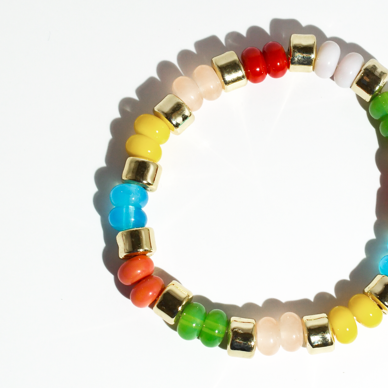 colorful gemstone jewelry, beaded fashion bracelet, gold or silver tone accessory, handcrafted beaded piece, trendy boho chic jewelry, vibrant statement wristwear, artisan handmade design, everyday stackable accessory, fashion jewelry for women, premium jewelry gift idea, boutique style wristwear, elevated modern jewelry