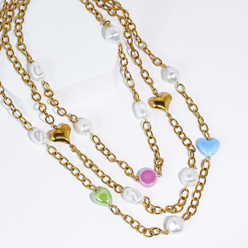 Colorful charms gold necklace featuring gemstone details, layered jewelry design, trendy accessory for women’s jewelry collections, boutique wholesale fashion necklace that is hypoallergenic, tarnish free, and waterproof jewelry with a cute aesthetic statement style