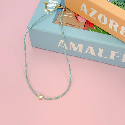 Tiny Gold Heartbeat Necklace