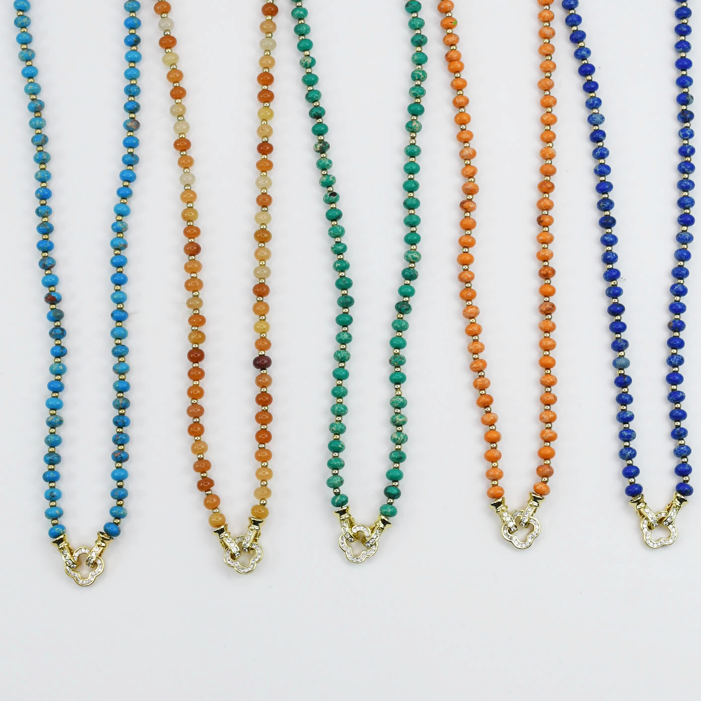 Colorful charms gold necklace featuring gemstone details, layered jewelry design, trendy accessory for women’s jewelry collections, boutique wholesale fashion necklace that is hypoallergenic, tarnish free, and waterproof jewelry with a cute aesthetic statement style