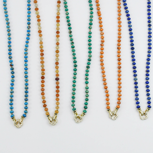 Colorful charms gold necklace featuring gemstone details, layered jewelry design, trendy accessory for women’s jewelry collections, boutique wholesale fashion necklace that is hypoallergenic, tarnish free, and waterproof jewelry with a cute aesthetic statement style