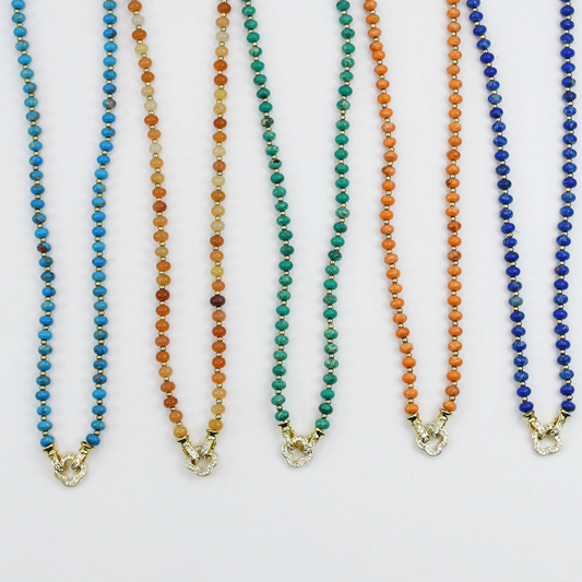 Colorful charms gold necklace featuring gemstone details, layered jewelry design, trendy accessory for women’s jewelry collections, boutique wholesale fashion necklace that is hypoallergenic, tarnish free, and waterproof jewelry with a cute aesthetic statement style