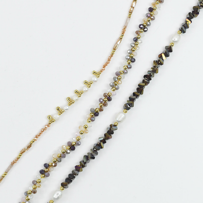 Colorful charms gold necklace featuring gemstone details, layered jewelry design, trendy accessory for women’s jewelry collections, boutique wholesale fashion necklace that is hypoallergenic, tarnish free, and waterproof jewelry with a cute aesthetic statement style