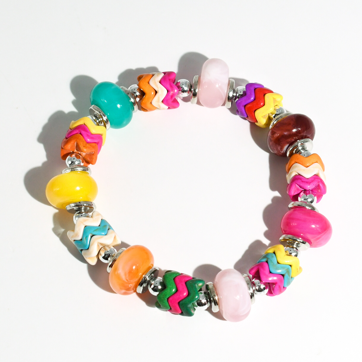 colorful gemstone jewelry, beaded fashion bracelet, gold or silver tone accessory, handcrafted beaded piece, trendy boho chic jewelry, vibrant statement wristwear, artisan handmade design, everyday stackable accessory, fashion jewelry for women, premium jewelry gift idea, boutique style wristwear, elevated modern jewelry